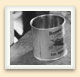 Filling Brown Bear honey tins, Jarvis, Ontario, ca 1920. 